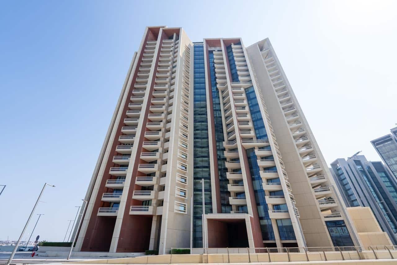 Marafid Tower Al Reem Island Abu Dhabi exterior showcasing modern architecture, waterfront setting, and premium residential apartments with skyline views